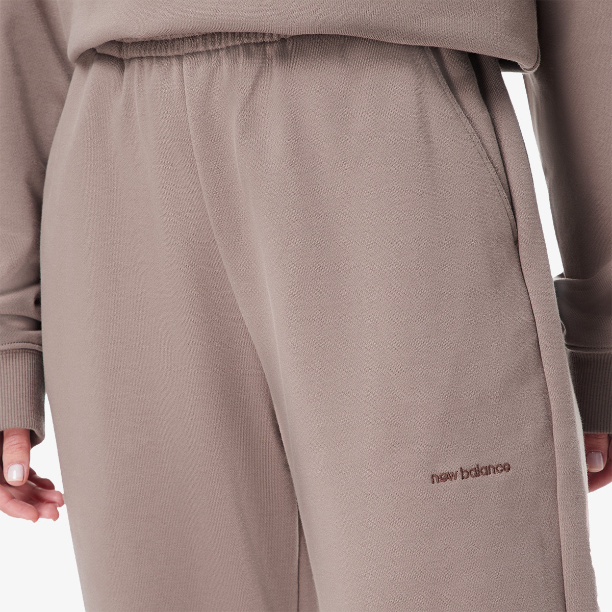 NEW BALANCE SPODNJI DELI TRENIRKE Athletics Linear Sweatpant 