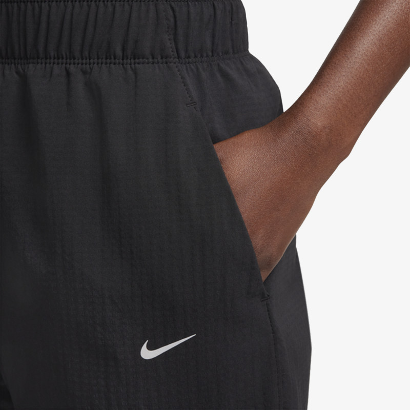NIKE SPODNJI DELI TRENIRKE W NK FAST DF WRM MR 7/8 PNT 