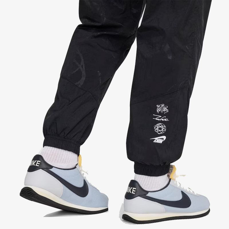NIKE SPODNJI DELI TRENIRKE Sportswear Breakdancing Lined Windrunner
