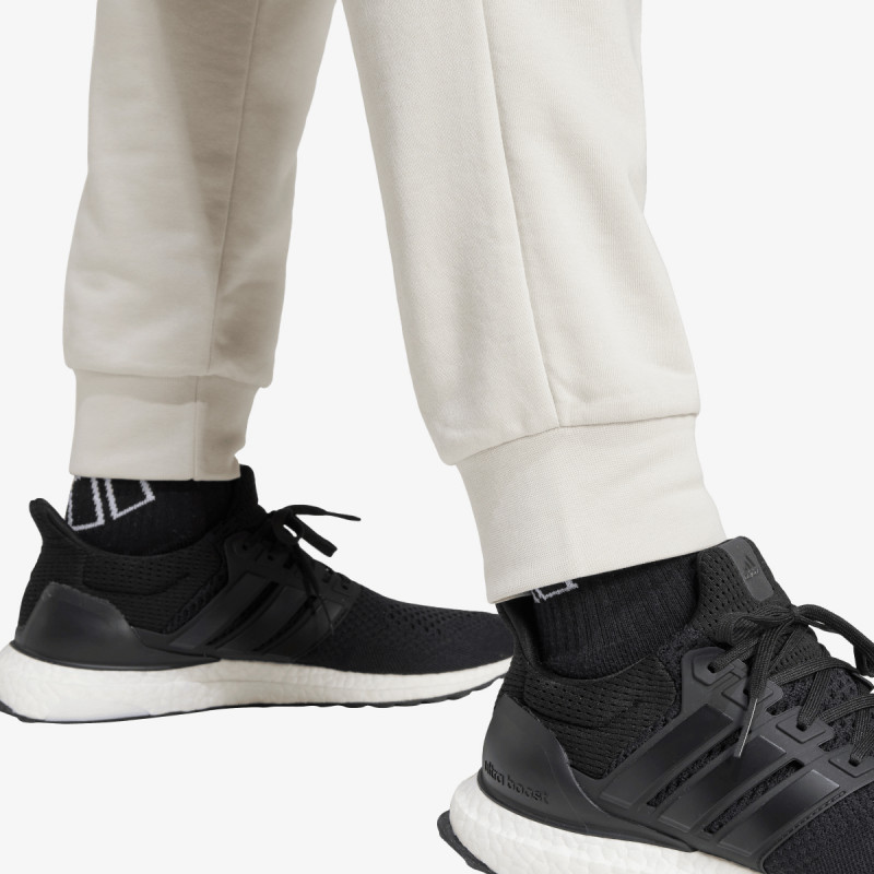 adidas SPODNJI DELI TRENIRKE M FEELCOZY PANT
