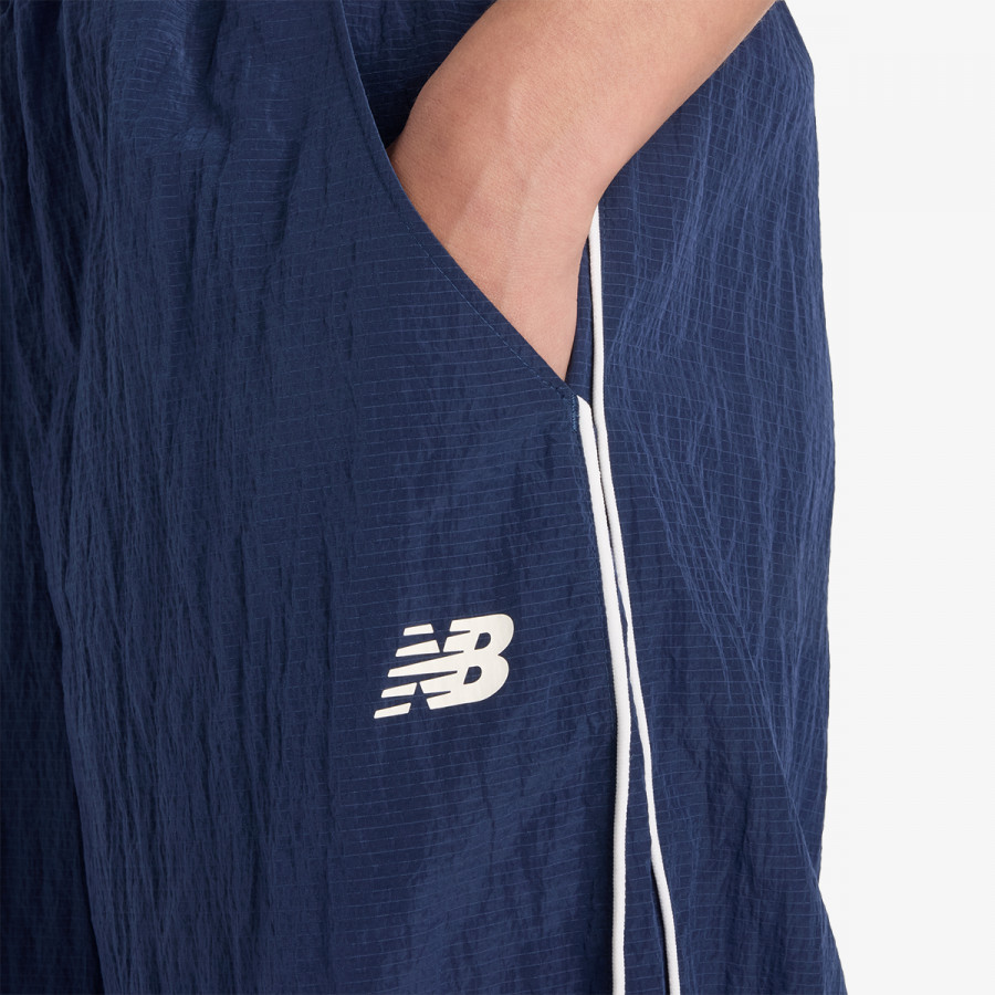 NEW BALANCE SPODNJI DELI TRENIRKE Sport Legacy Pant 